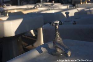 Photo of a vintage sink faucet attached to a sink