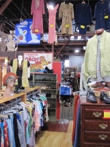 Antique clothing hangs high for better viewing